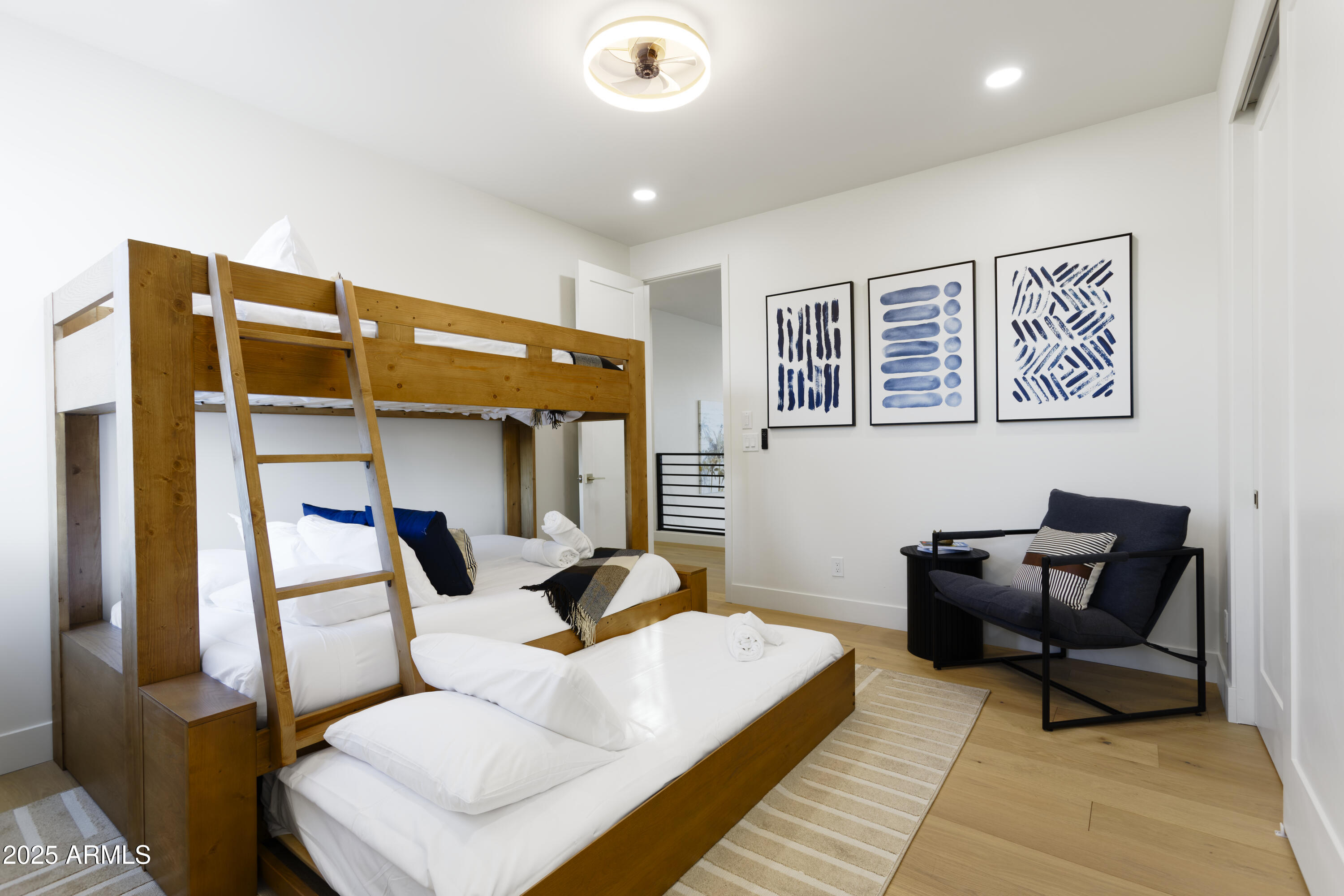 7520 East Highland Avenue Scottsdale, AZ 85251 - Photo 22 of 52 a bedroom with a bed and furniture