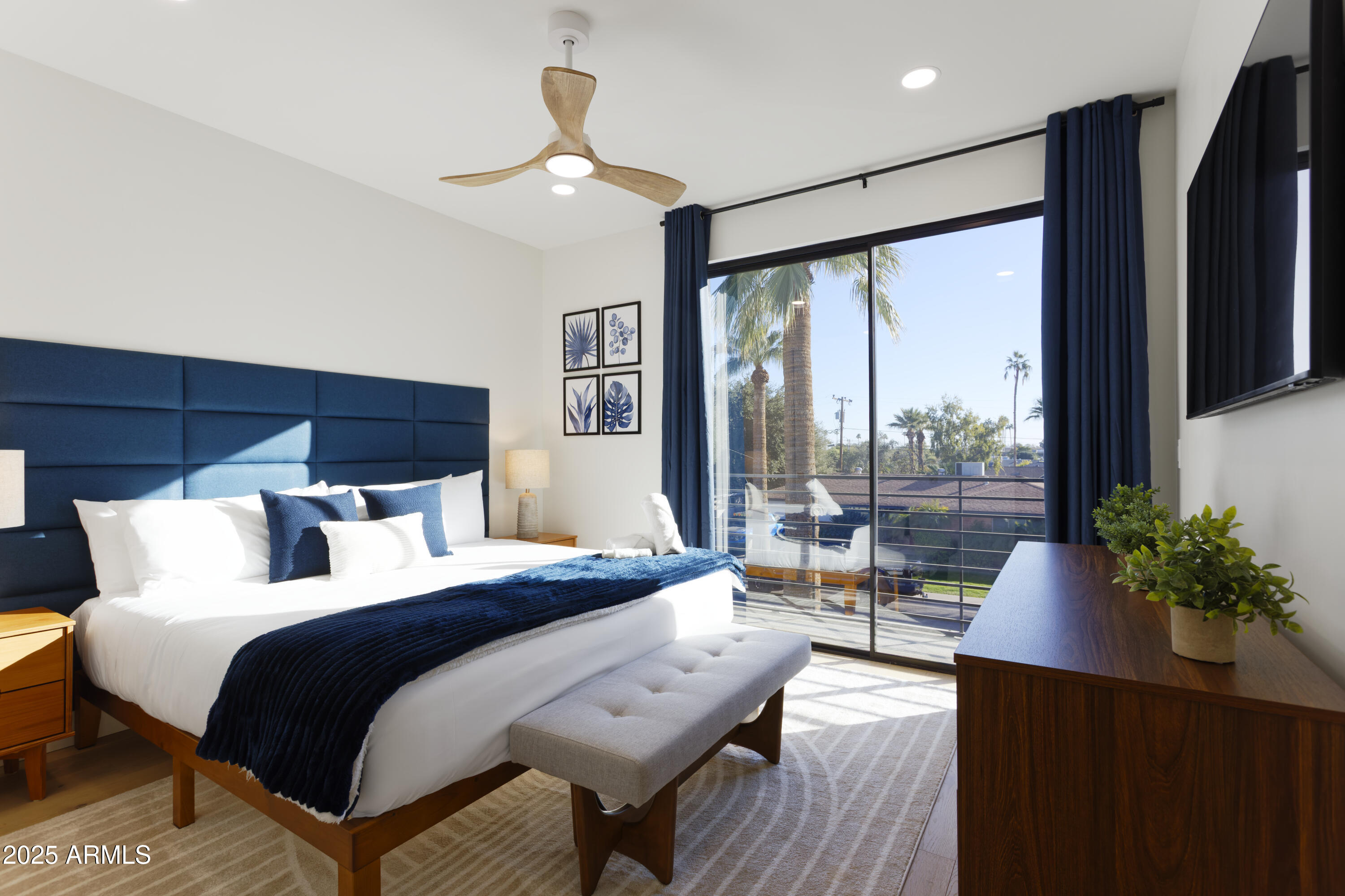 7520 East Highland Avenue Scottsdale, AZ 85251 - Photo 26 of 52 a bedroom with a bed and a large window