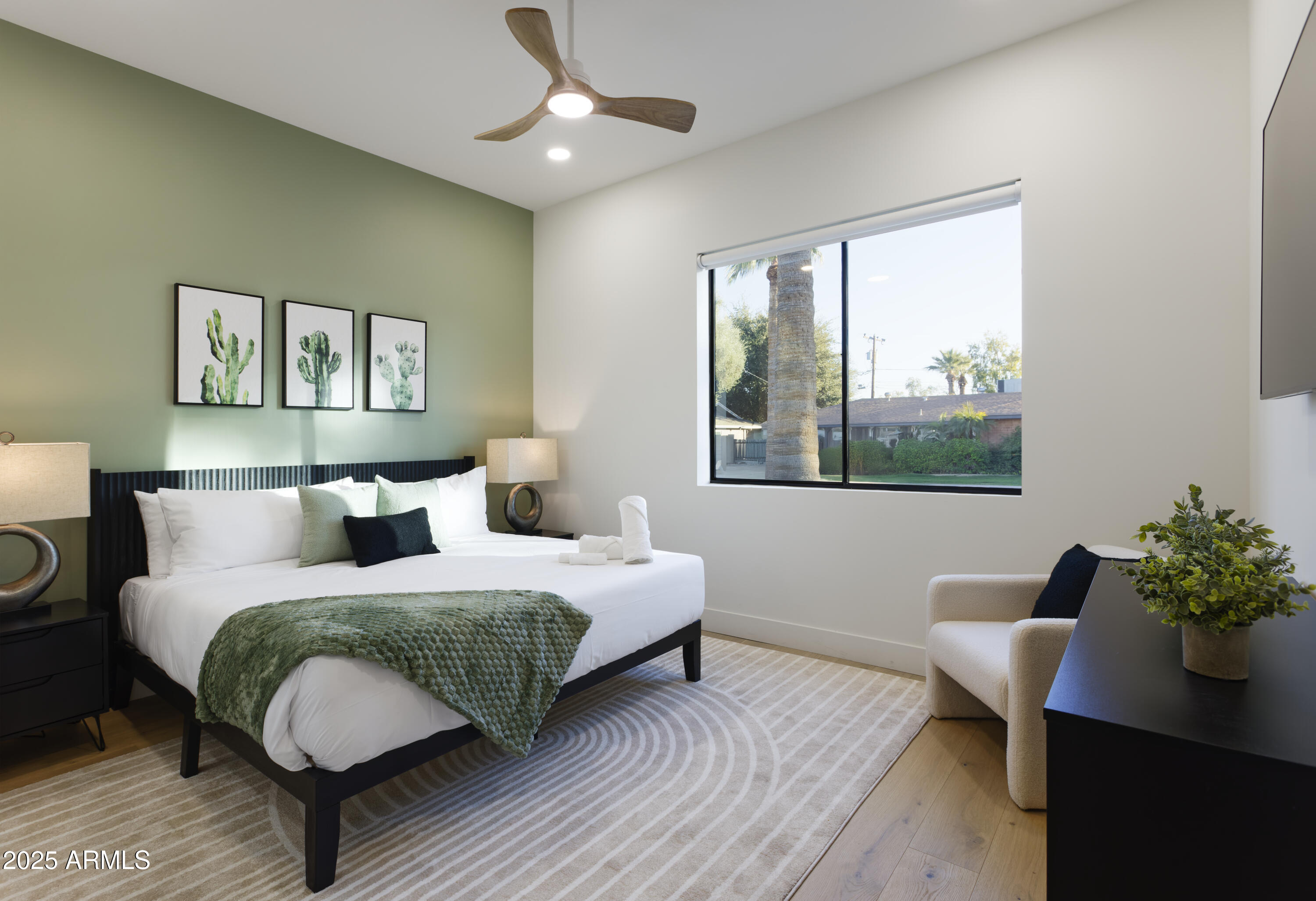 7520 East Highland Avenue Scottsdale, AZ 85251 - Photo 31 of 52 a bedroom with a bed potted plant and a window