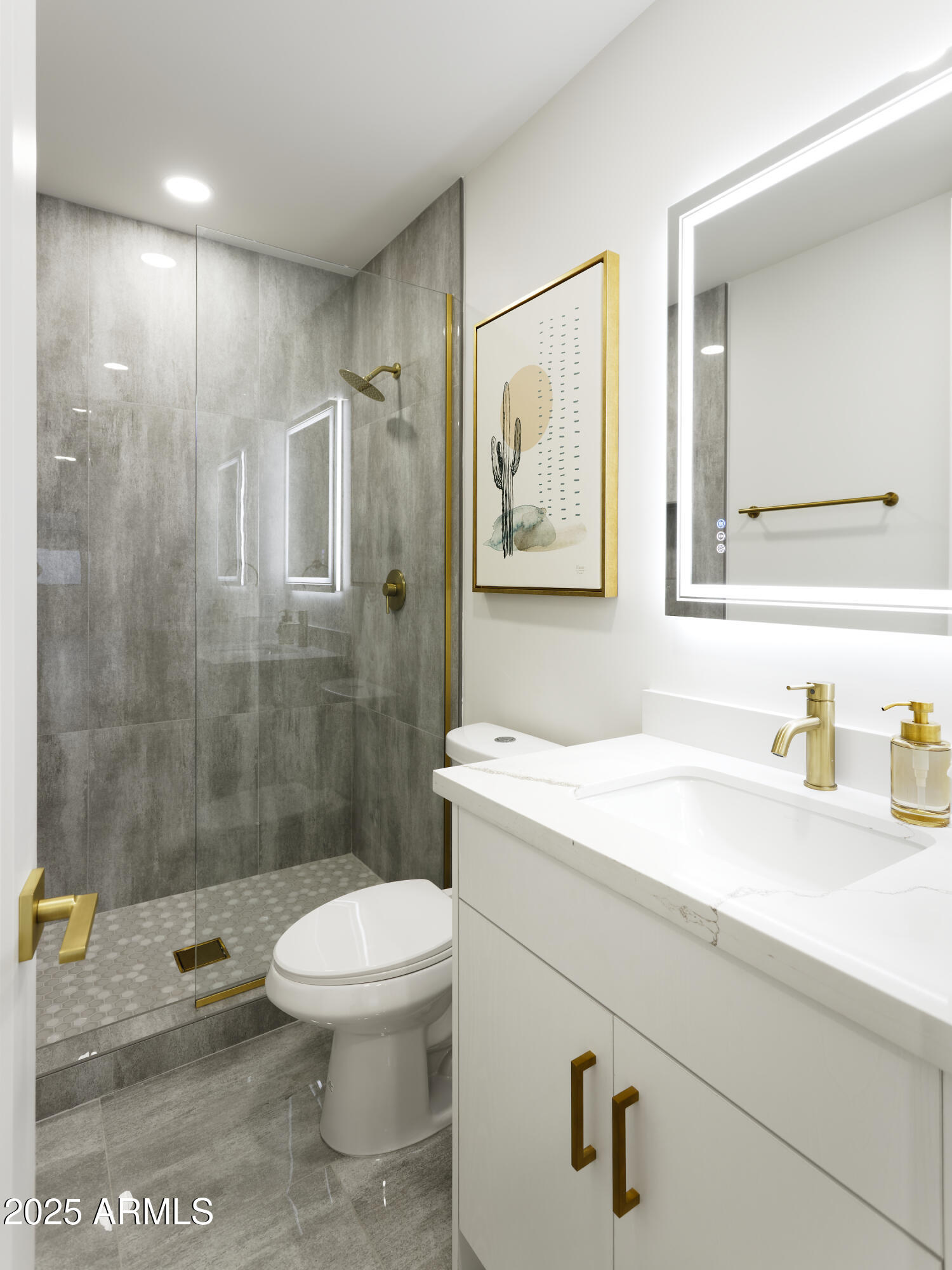 7520 East Highland Avenue Scottsdale, AZ 85251 - Photo 33 of 52 a bathroom with a sink a toilet and shower