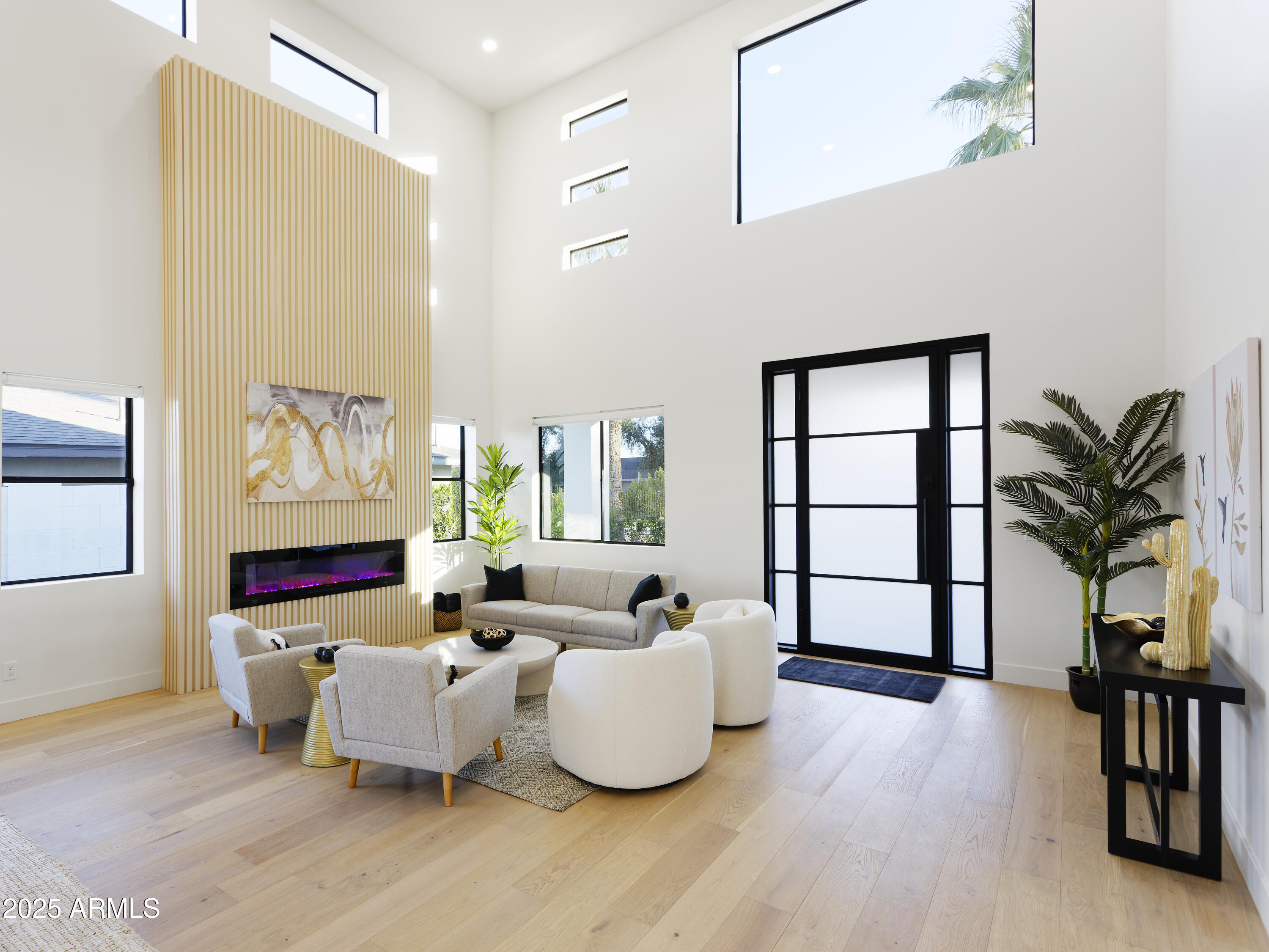 7520 East Highland Avenue Scottsdale, AZ 85251 - Photo 6 of 52 a living room with furniture and a large window