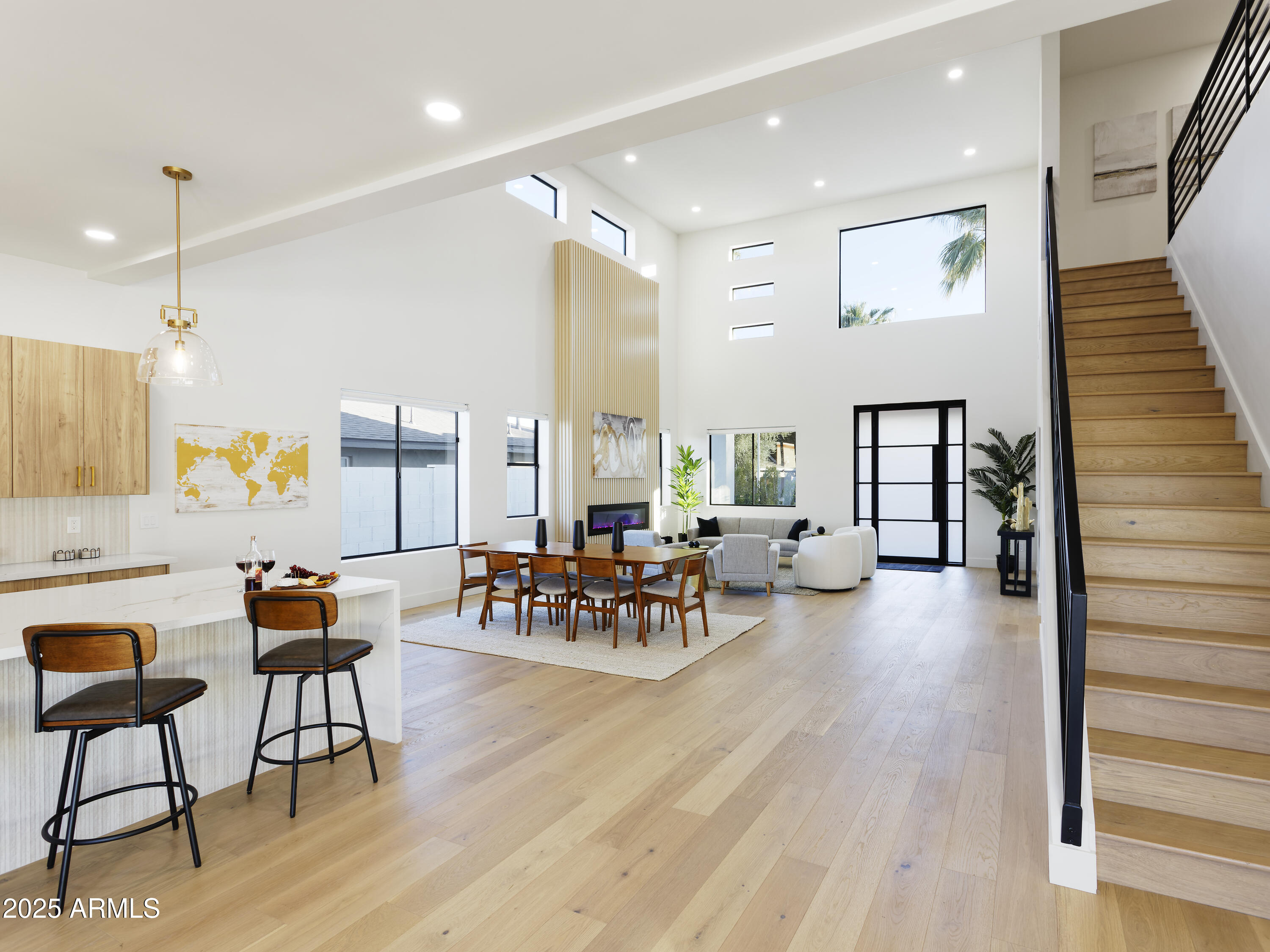 7520 East Highland Avenue Scottsdale, AZ 85251 - Photo 10 of 52 a living room with furniture and wooden floor