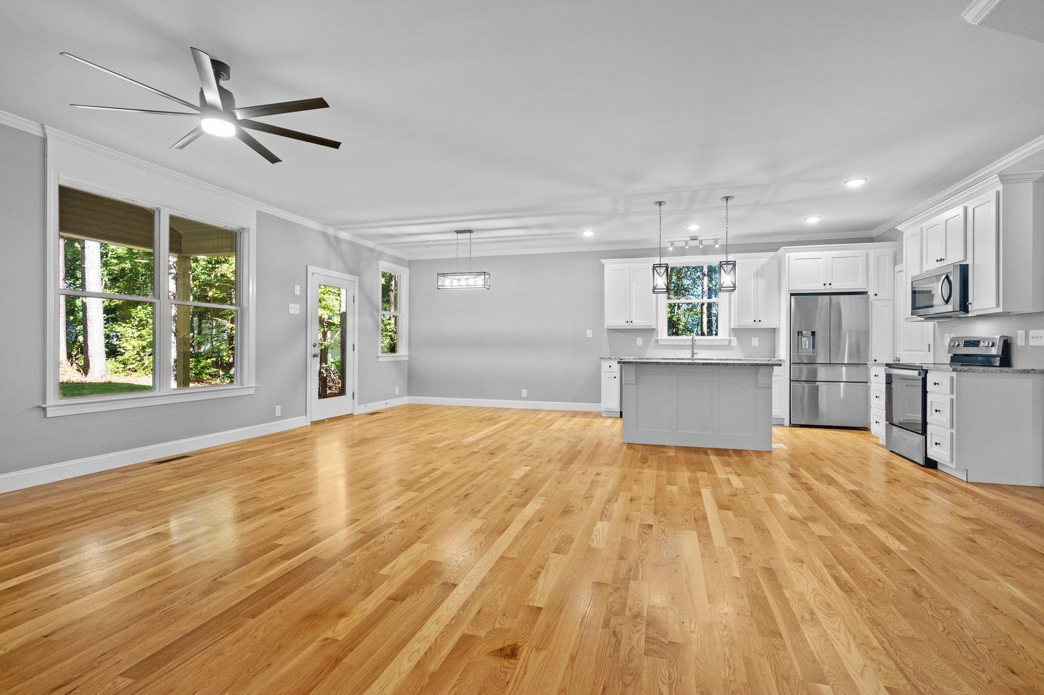 4539 Gresham Drive Oxford, NC 27565 - Photo 20 of 43 a view of kitchen with wooden floor and window