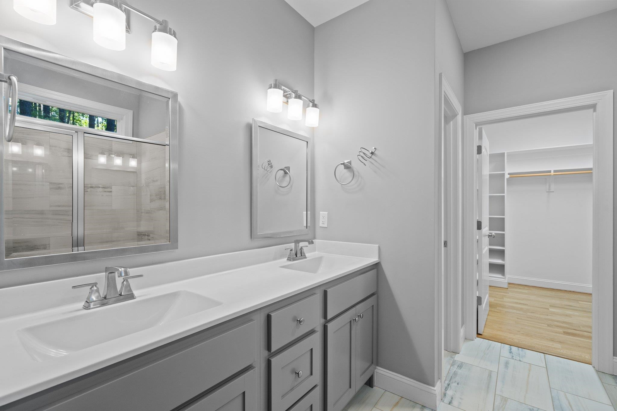 4539 Gresham Drive Oxford, NC 27565 - Photo 24 of 43 a bathroom with a sink double vanity and a mirror