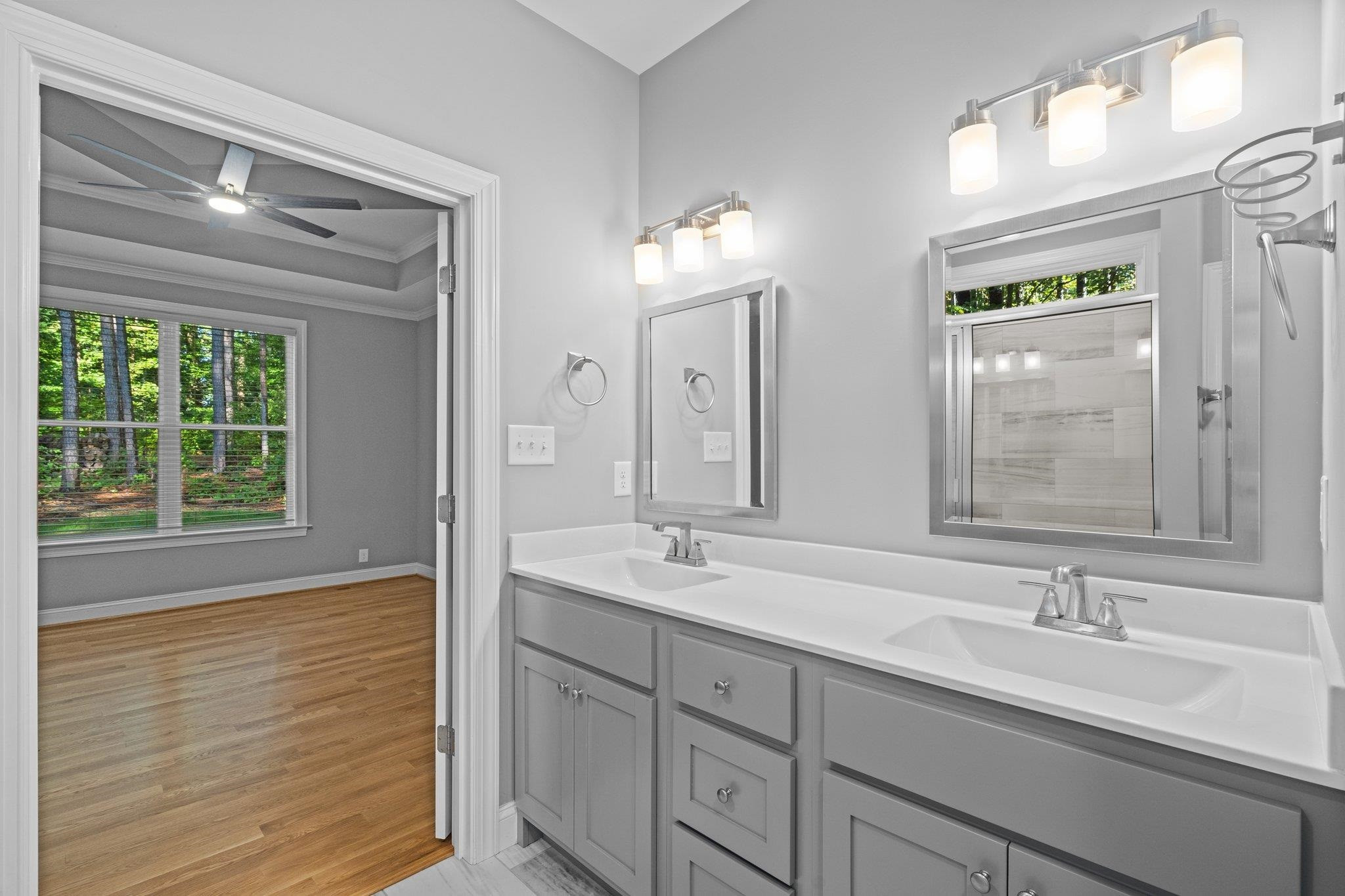 4539 Gresham Drive Oxford, NC 27565 - Photo 27 of 43 a bathroom with double vanity and a mirror