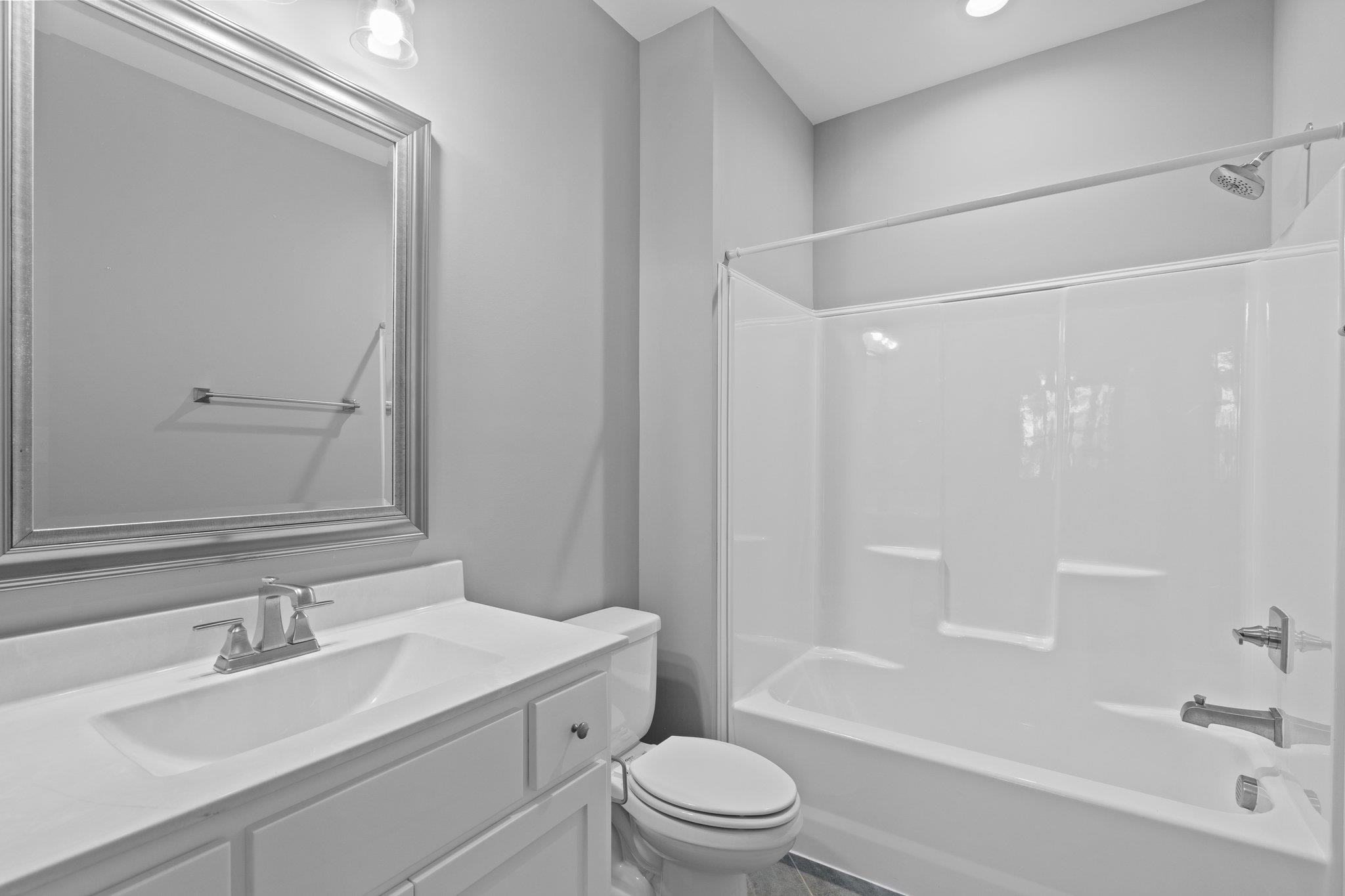 4539 Gresham Drive Oxford, NC 27565 - Photo 31 of 43 a bathroom with a sink toilet vanity and shower