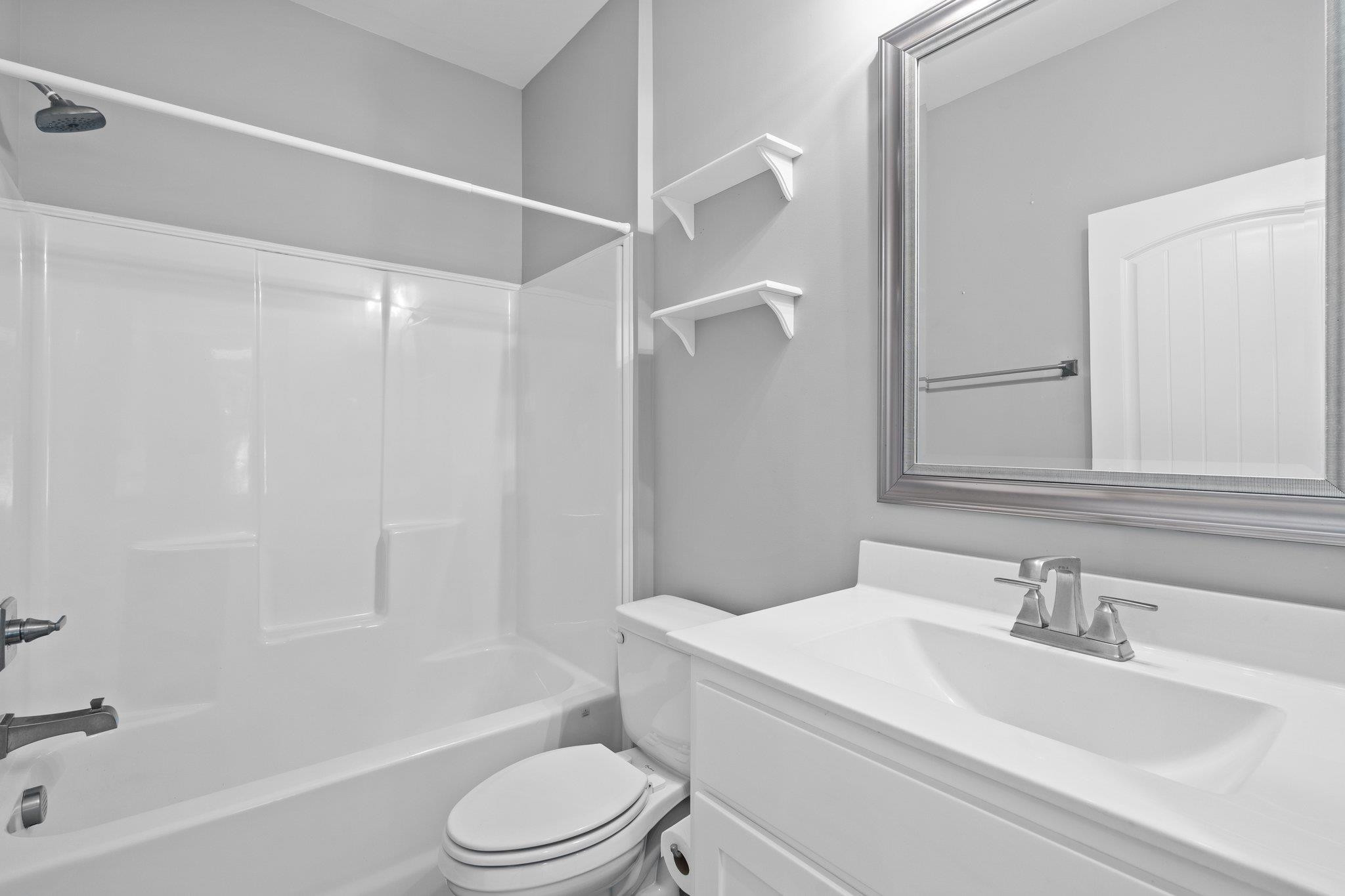 4539 Gresham Drive Oxford, NC 27565 - Photo 9 of 43 a bathroom with a sink toilet and shower