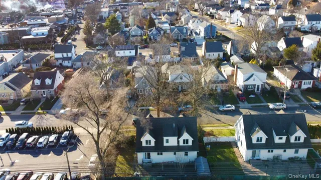 an aerial view of a swimming pool and outdoor space