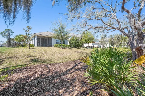 a view of lake with green space