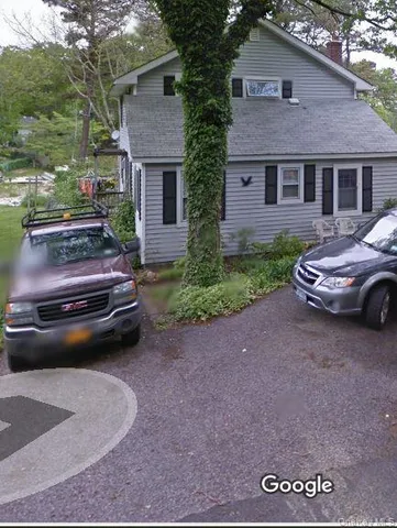 a car parked in front of a house