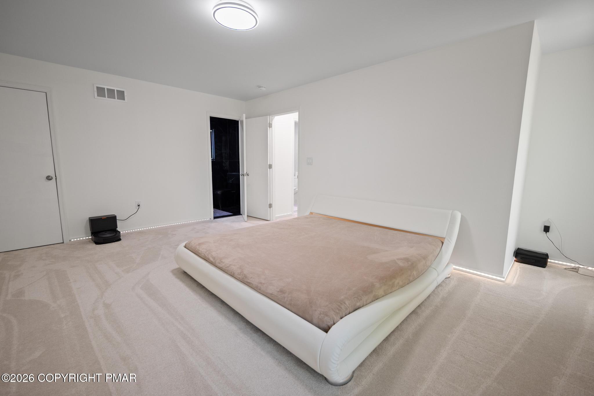 2312 Cramer Court Bushkill, PA 18324 - Photo 24 of 37 a bed sitting in a spacious bedroom