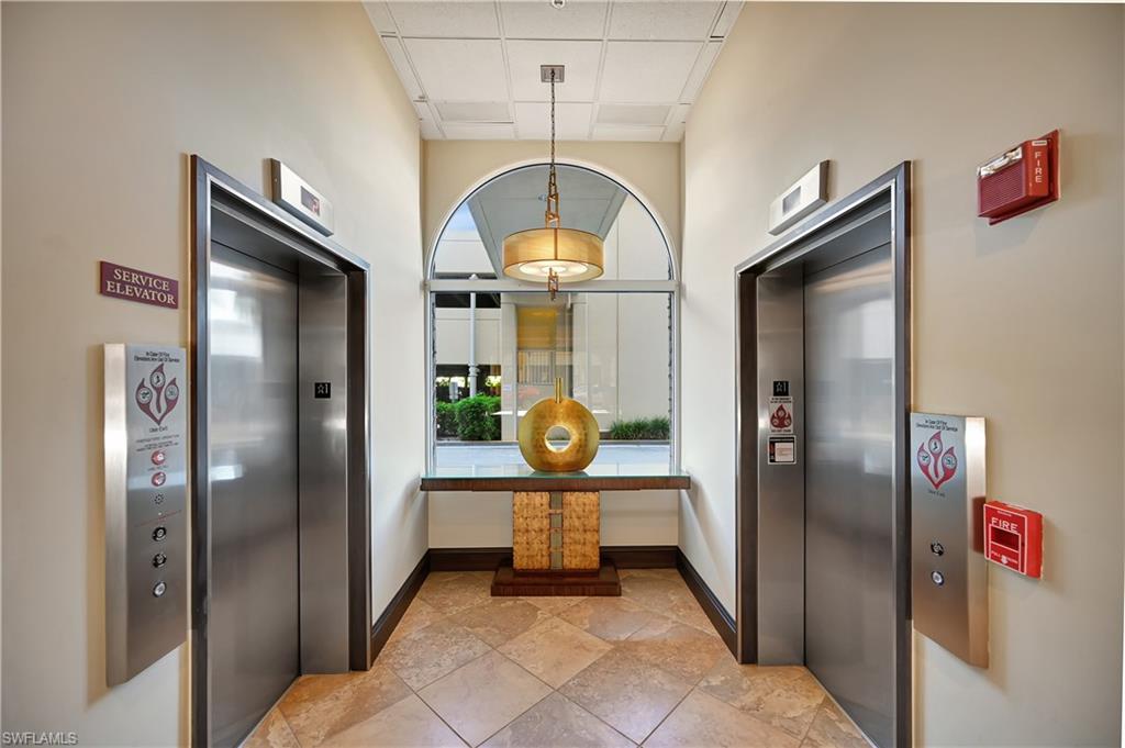 410 Bayfront Place, Unit 2409 Naples, FL 34102 - Photo 2 of 23 a view of a hallway with elevator