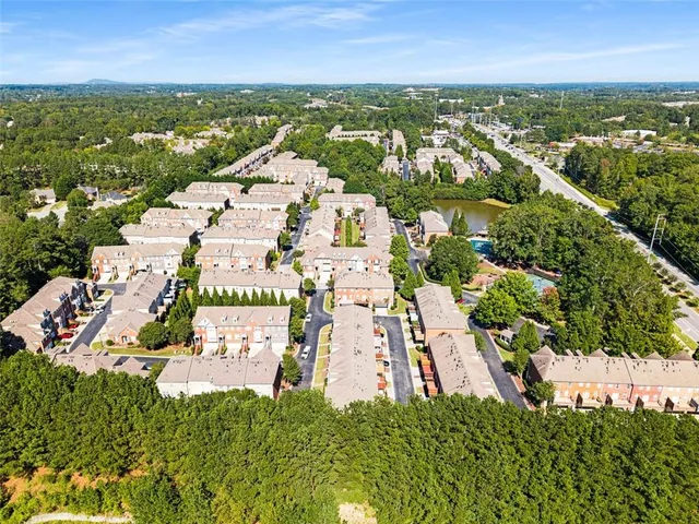 an aerial view of residential building with outdoor space