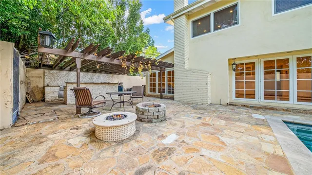 a view of a house with swimming pool