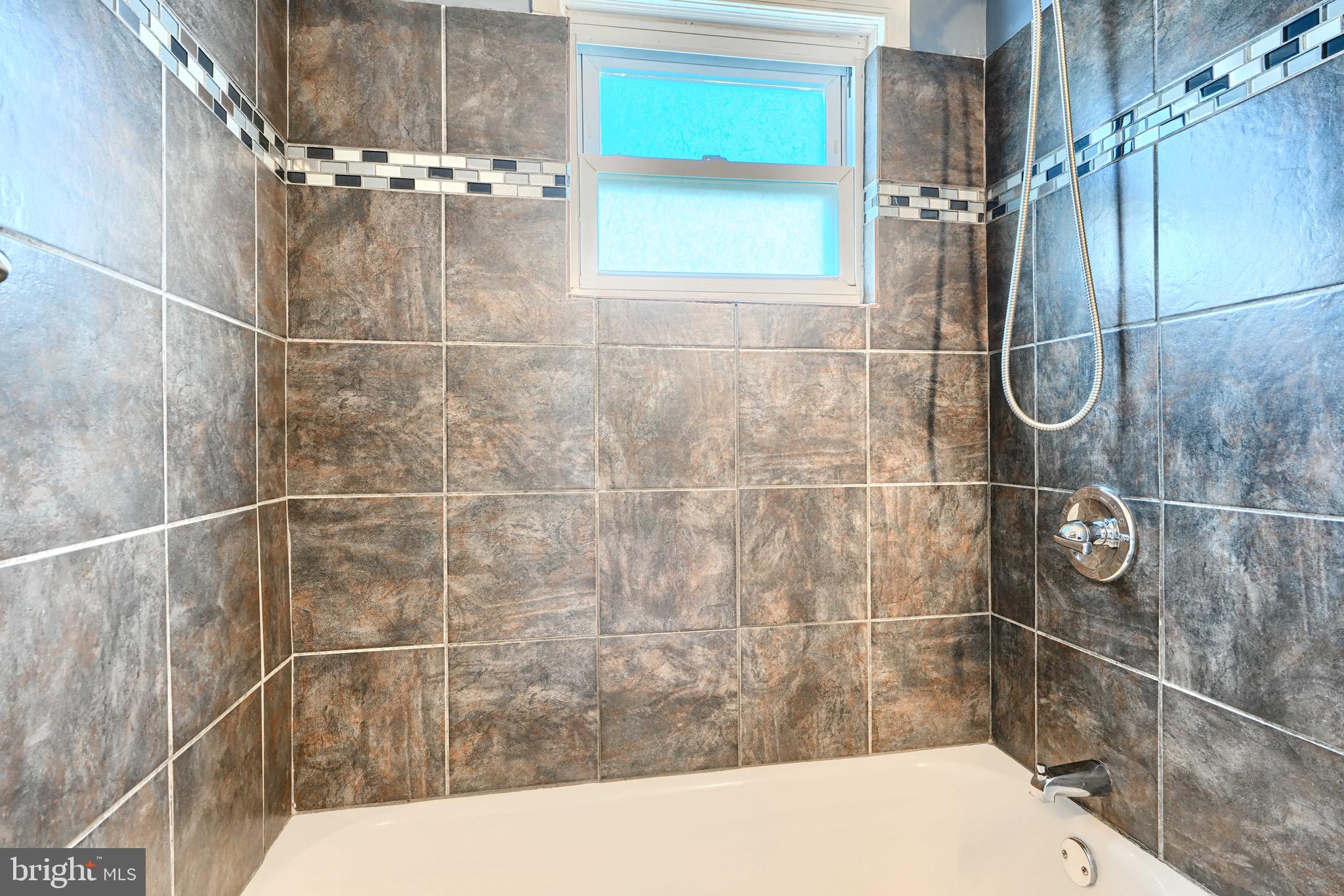 815 Lannerton Road Baltimore, MD 21220 - Photo 34 of 41 a bathroom with a shower