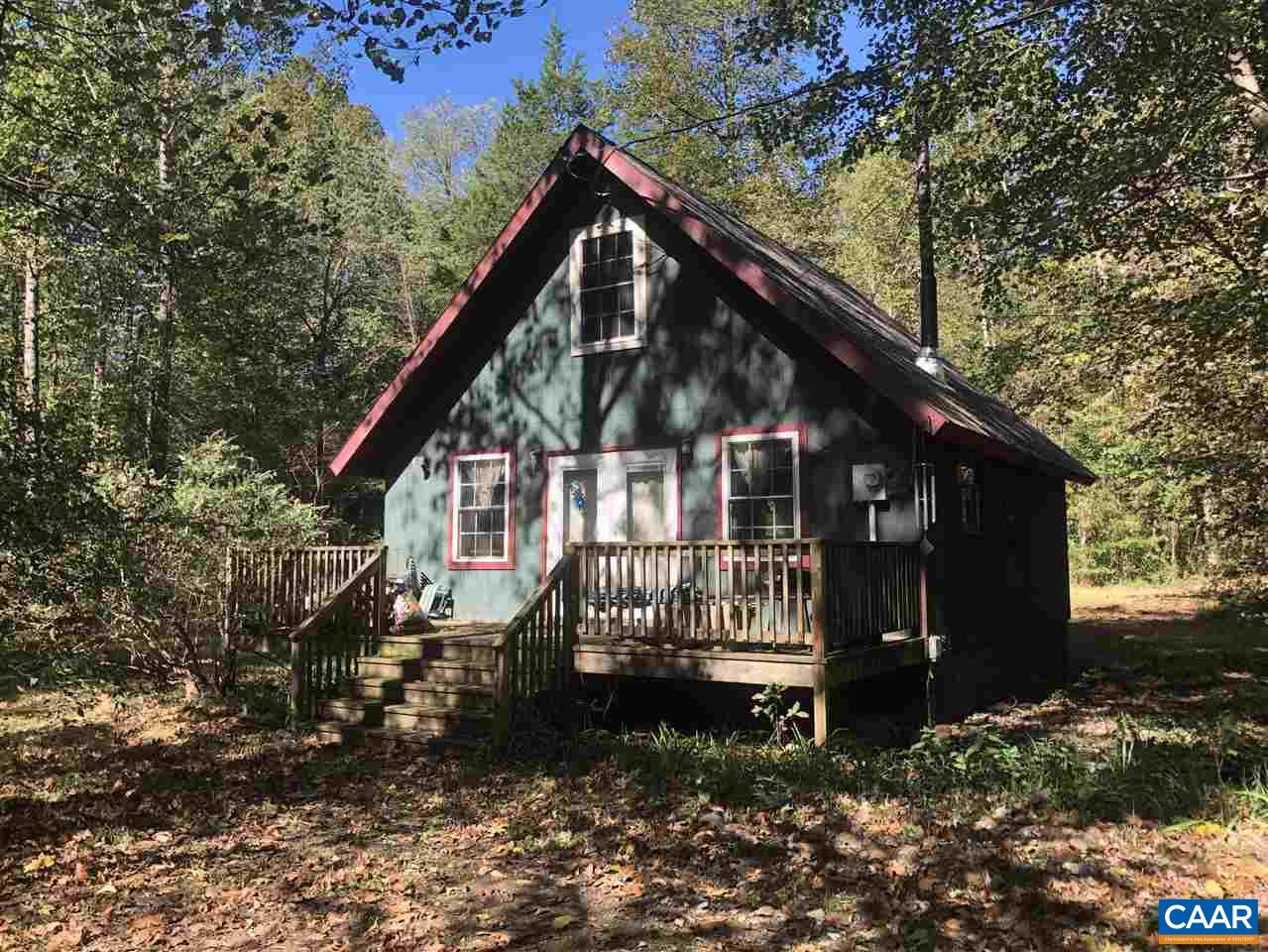 330 Rocky Road Stanardsville, VA 22973 - Photo 1 of 18 a front view of a house with a yard