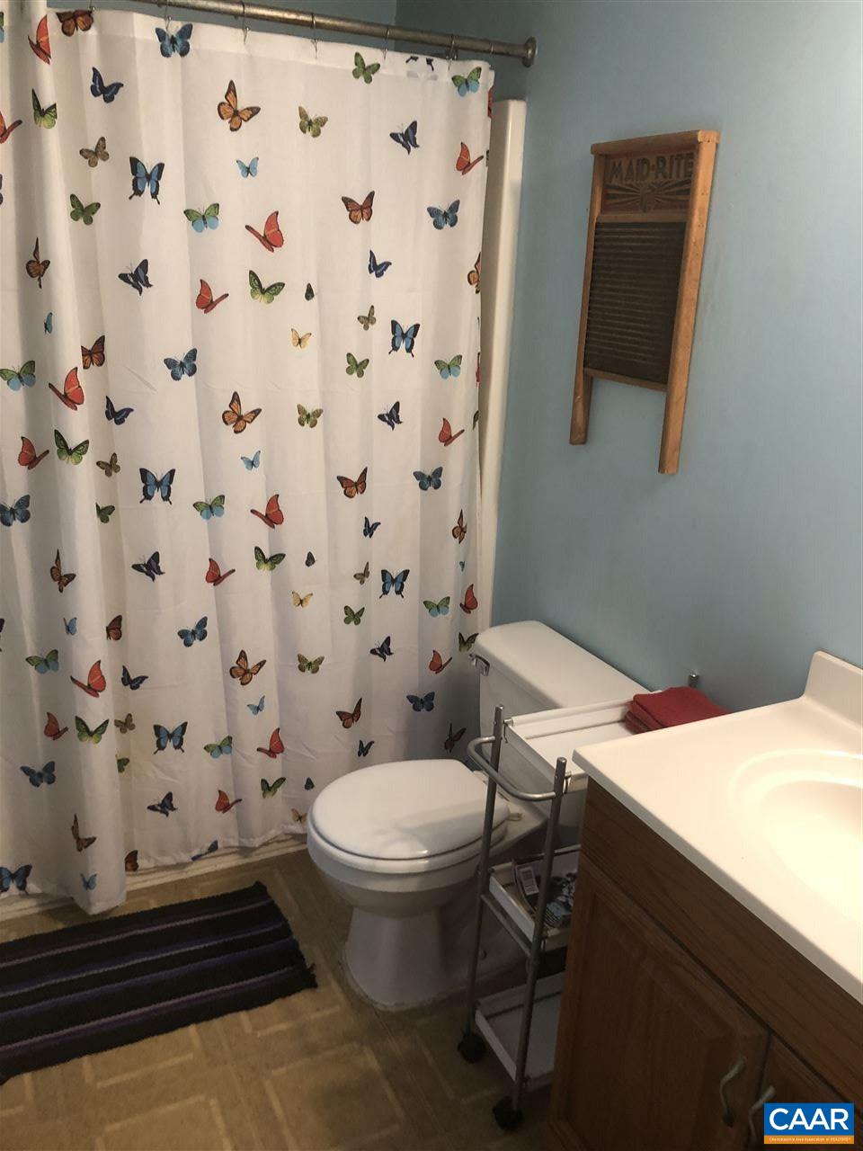 330 Rocky Road Stanardsville, VA 22973 - Photo 11 of 18 a bathroom with a sink and a toilet