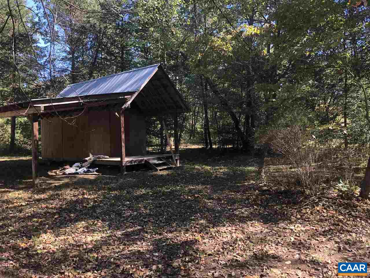 330 Rocky Road Stanardsville, VA 22973 - Photo 17 of 18 a view of a barn in the middle of a yard