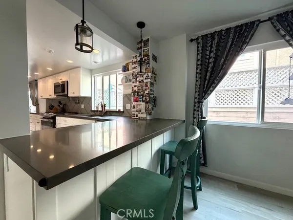 a bathroom with a sink and toilet
