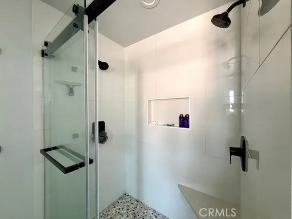 a utility room with closet dryer and washer