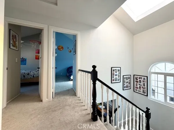 a bedroom with a bed and a cabinets