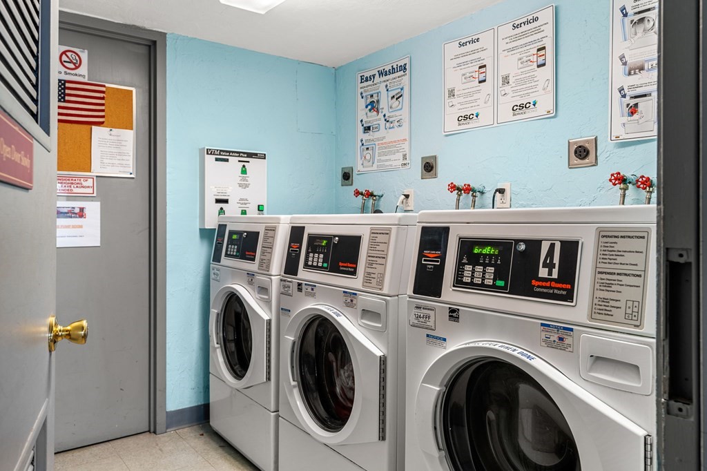 159 Franklin Street, Unit D2 Stoneham, MA 02180 - Photo 26 of 27 a utility room with dryer and washer