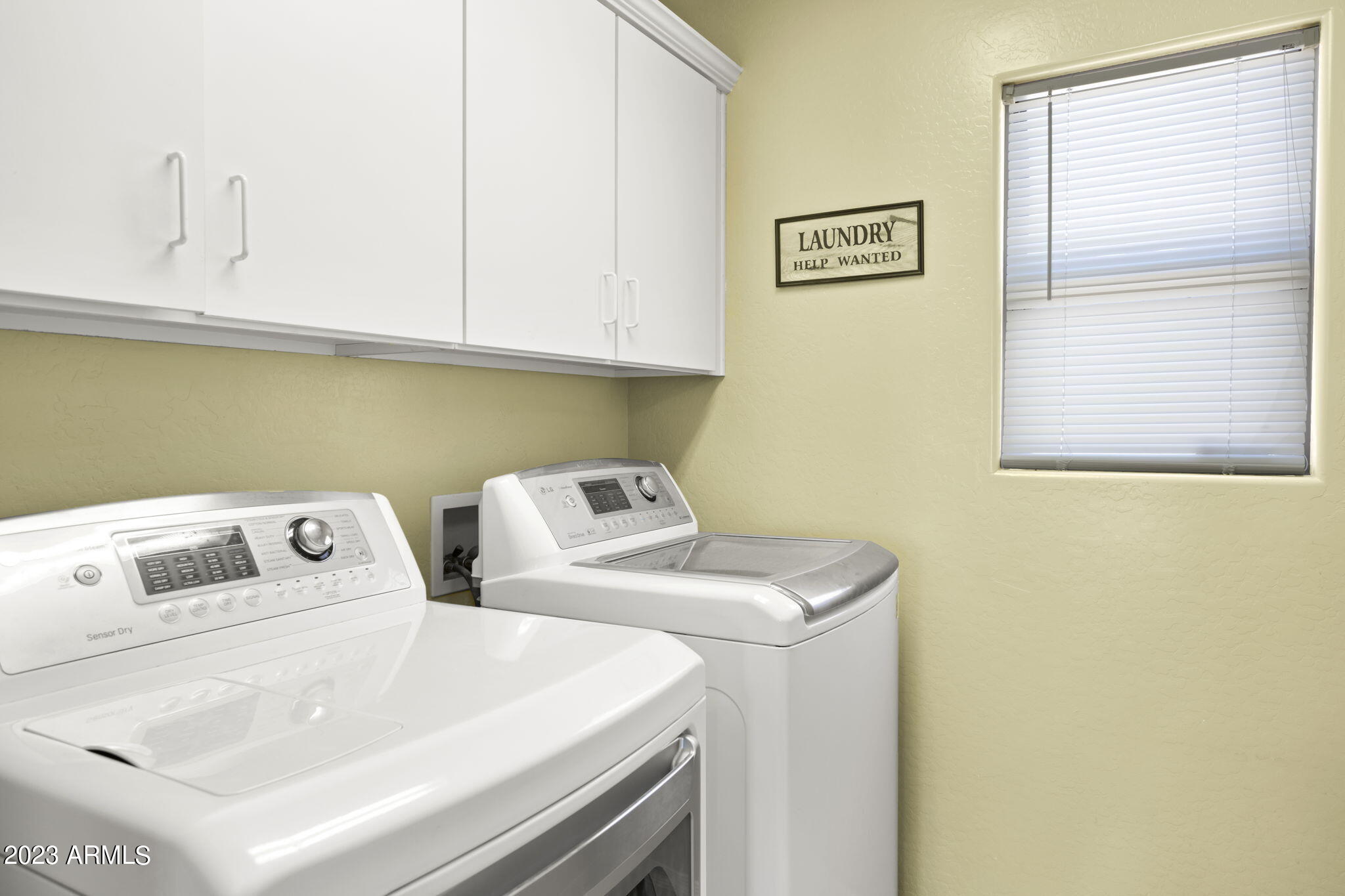 3739 West Memorial Drive Anthem, AZ 85086 - Photo 19 of 23 a utility room with dryer and washer