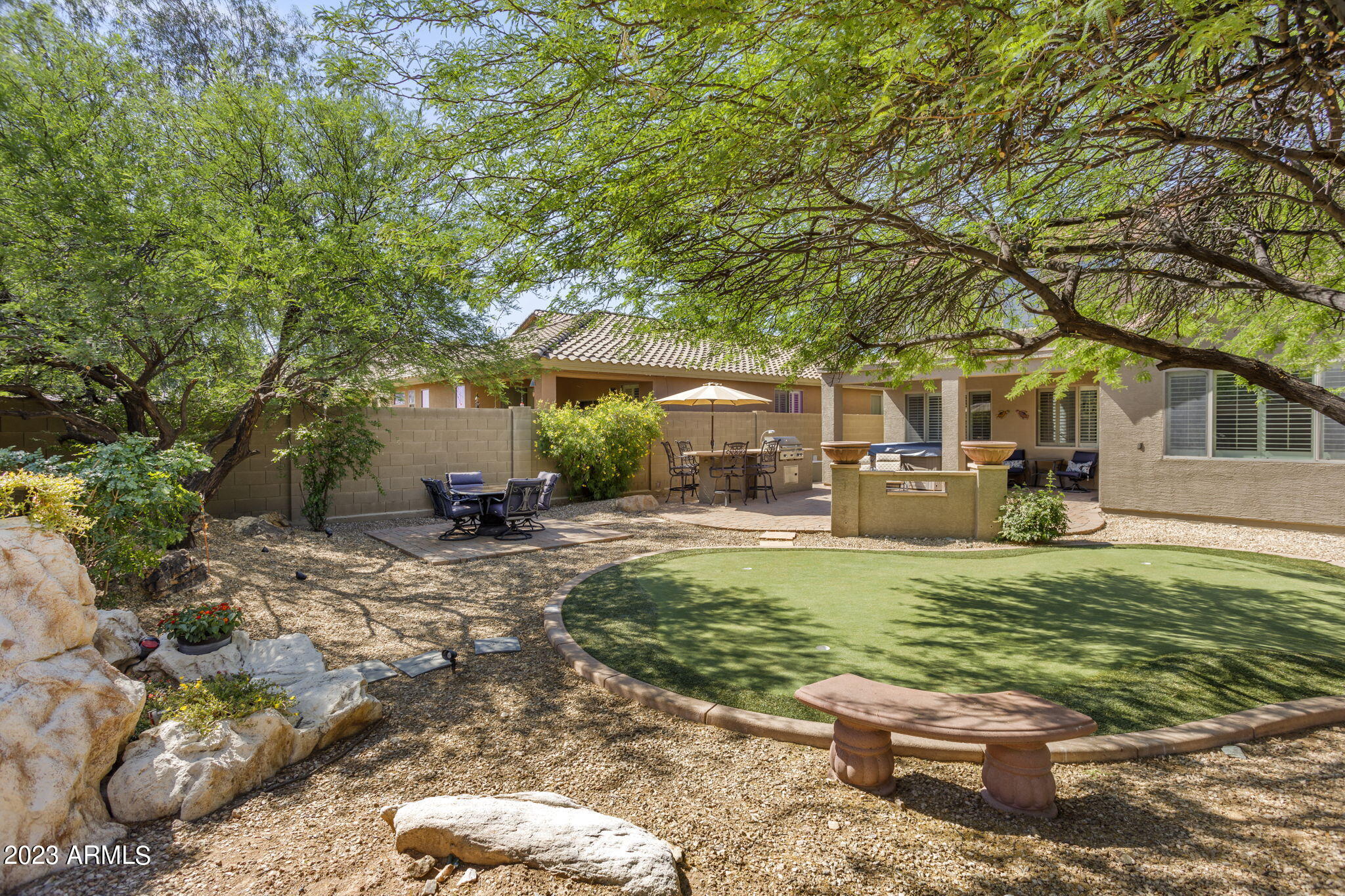 3739 West Memorial Drive Anthem, AZ 85086 - Photo 21 of 23 a view of a swimming pool with a patio