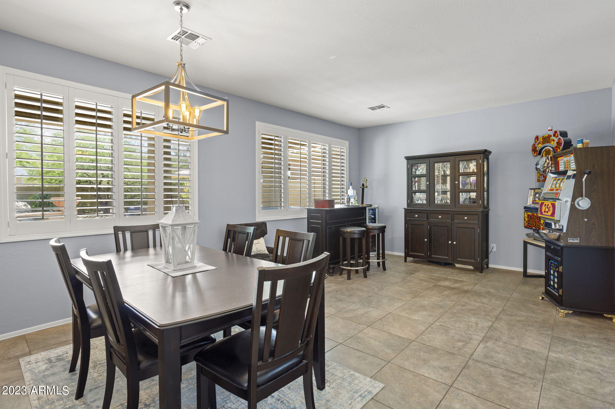 3739 West Memorial Drive Anthem, AZ 85086 - Photo 4 of 23 a view of a dining room with furniture