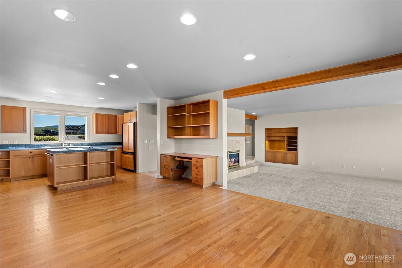 500 Connery Road Wenatchee, WA 98801 - Photo 12 of 39 a large living room with stainless steel appliances granite countertop a stove and a refrigerator