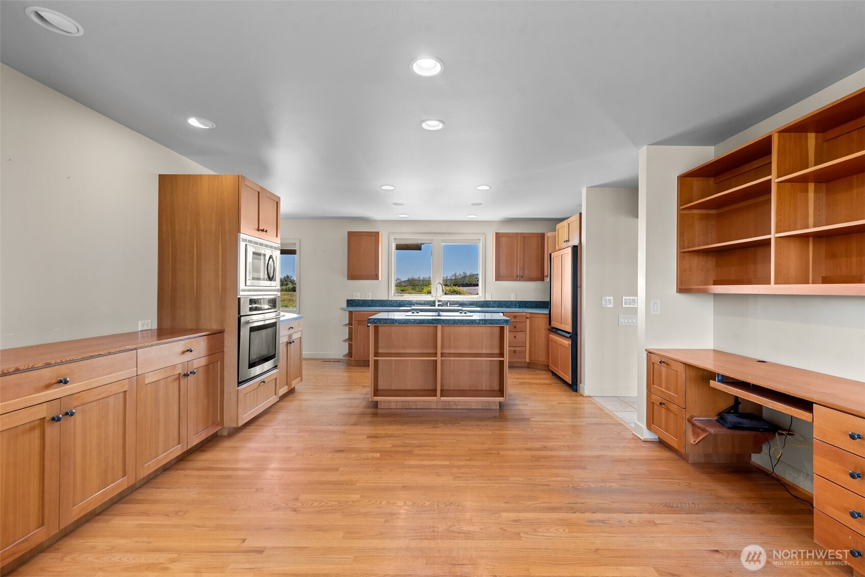 500 Connery Road Wenatchee, WA 98801 - Photo 10 of 39 a large kitchen with stainless steel appliances granite countertop a refrigerator and a stove top oven