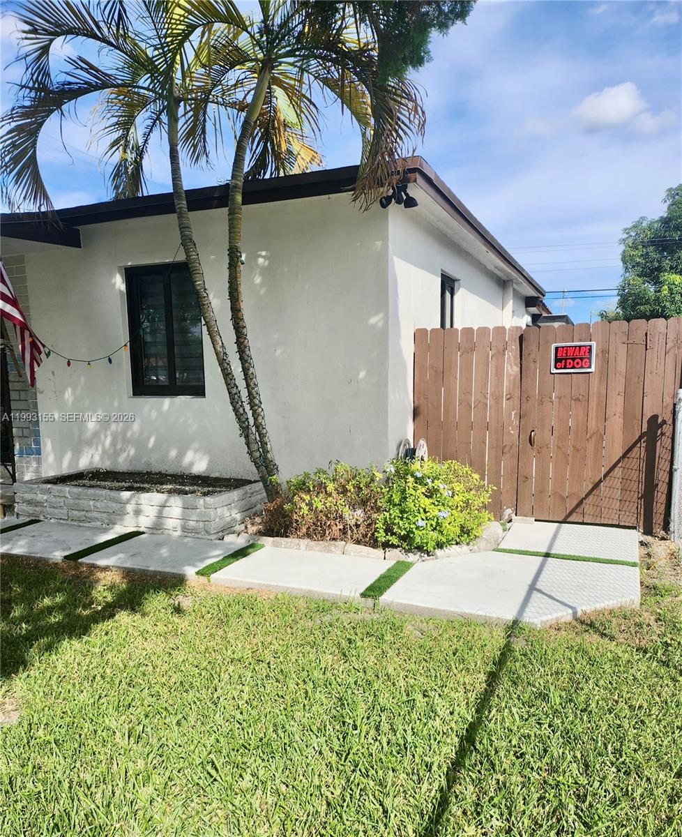 201 Southwest 62nd Avenue Miami, FL 33144 - Photo 2 of 5 a view of a back yard of the house