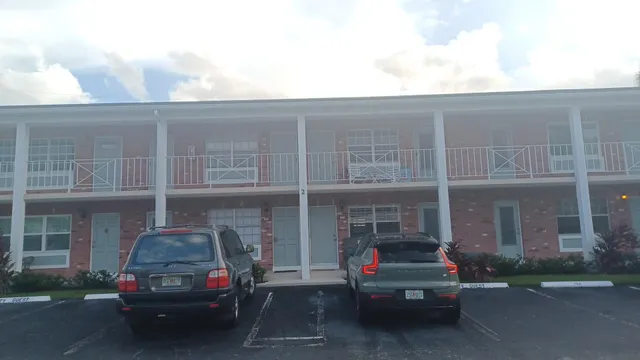 a car parked in front of a building