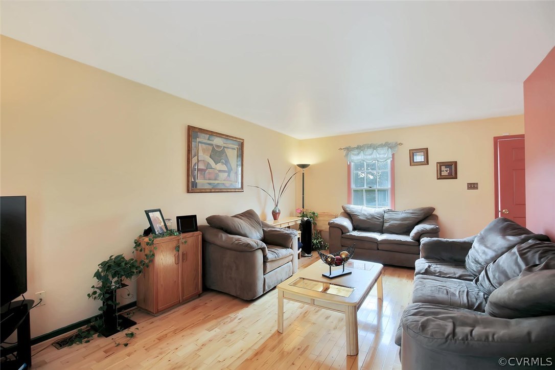 6400 Oldbern Road Chesterfield, VA 23832 - Photo 5 of 19 a living room with furniture and a flat screen tv