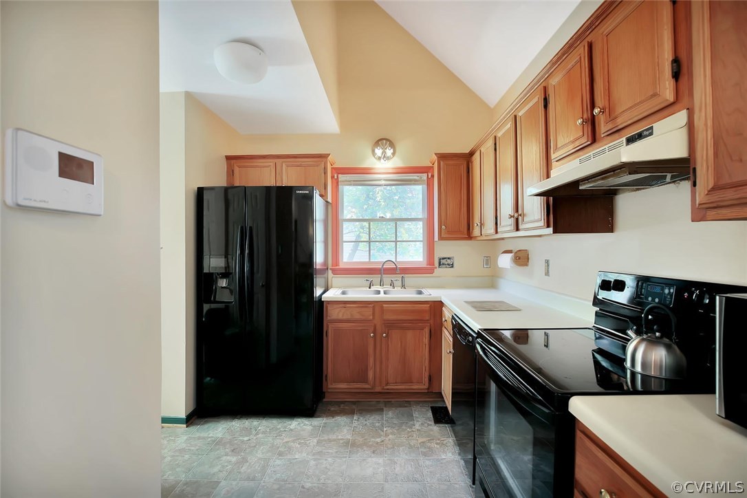 6400 Oldbern Road Chesterfield, VA 23832 - Photo 10 of 19 a kitchen with a refrigerator and a sink