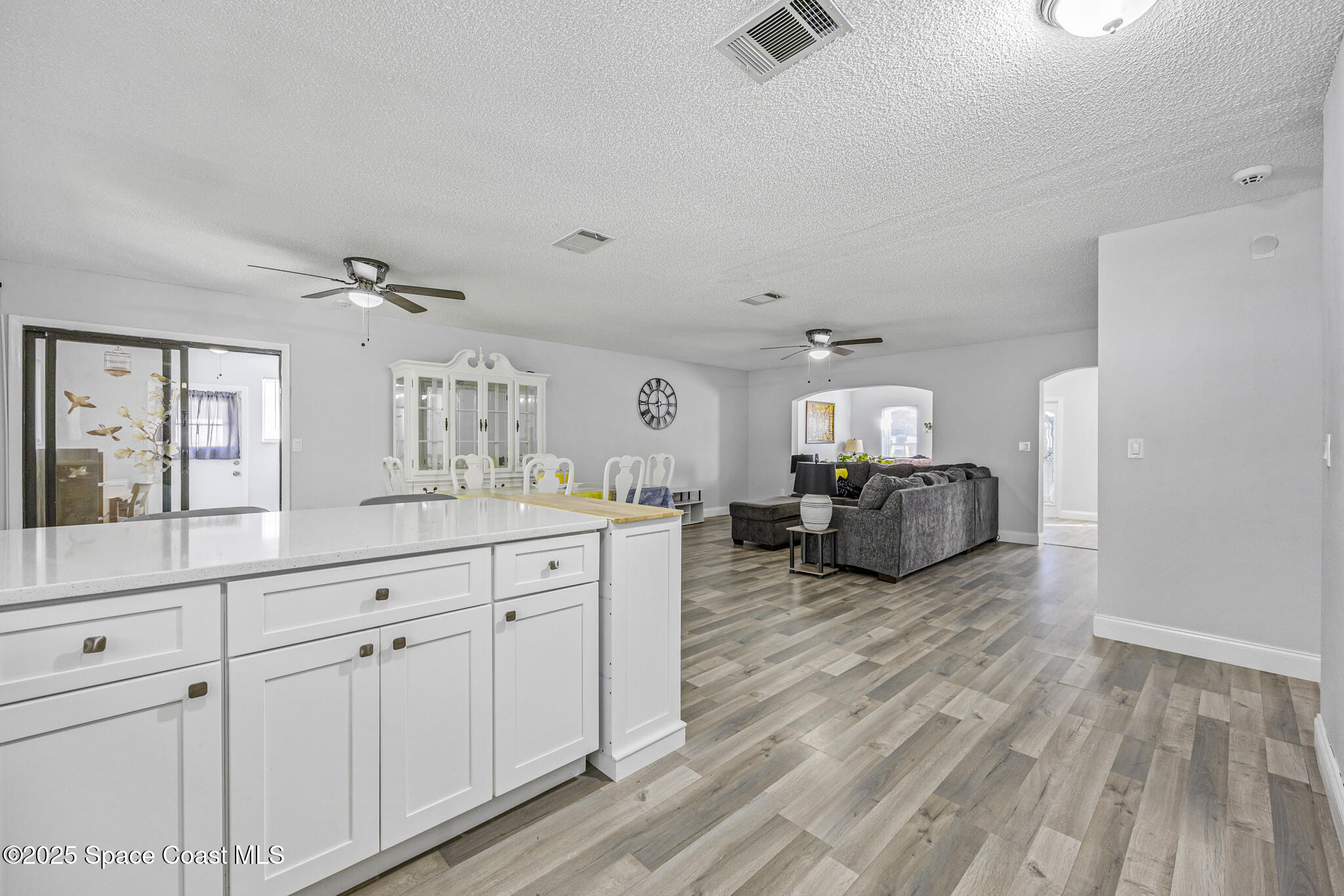 797 Tooley Road Southwest Palm Bay, FL 32908 - Photo 19 of 38 a living room with furniture and a large window