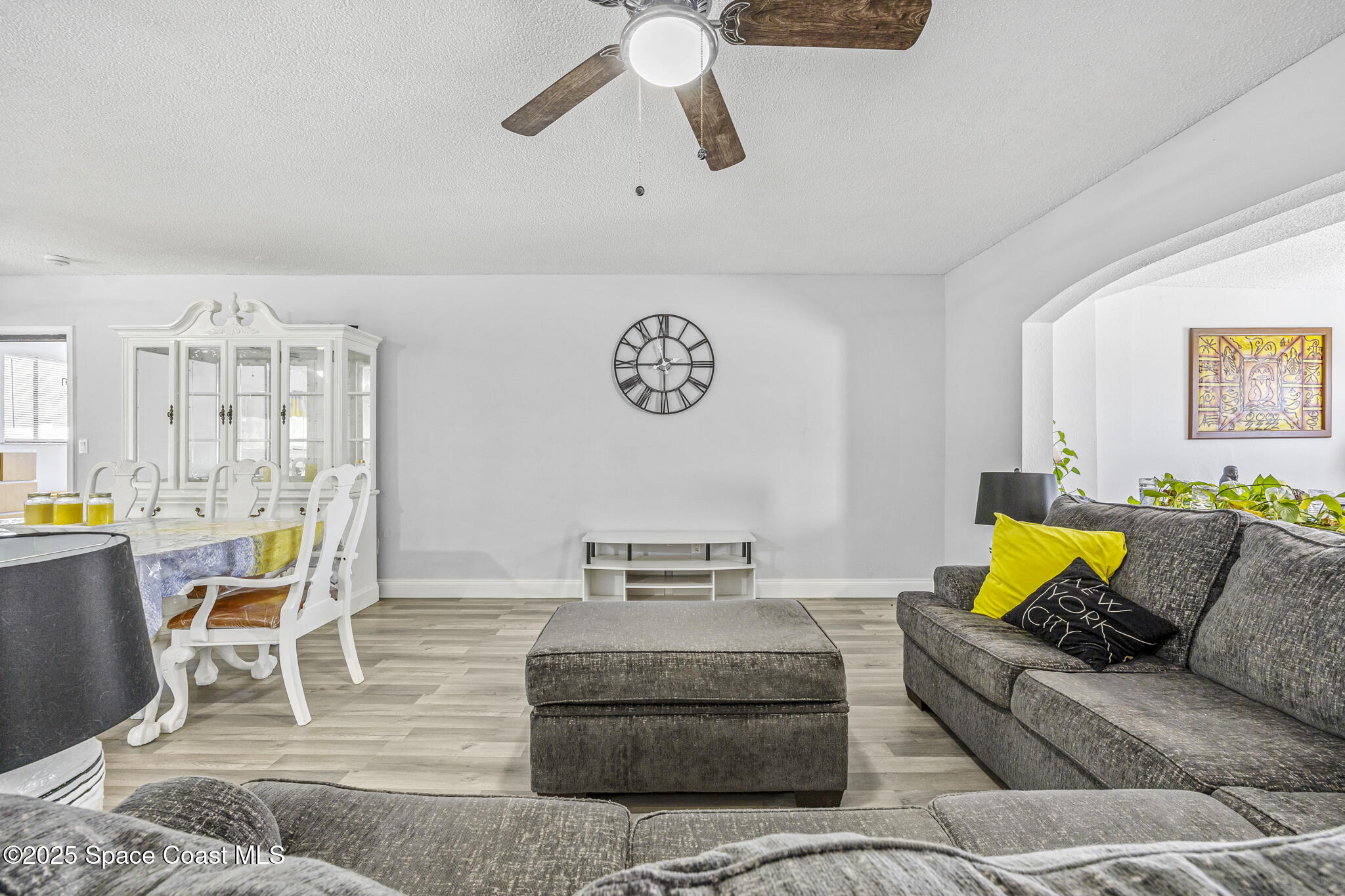 797 Tooley Road Southwest Palm Bay, FL 32908 - Photo 22 of 38 a living room with furniture and a couch