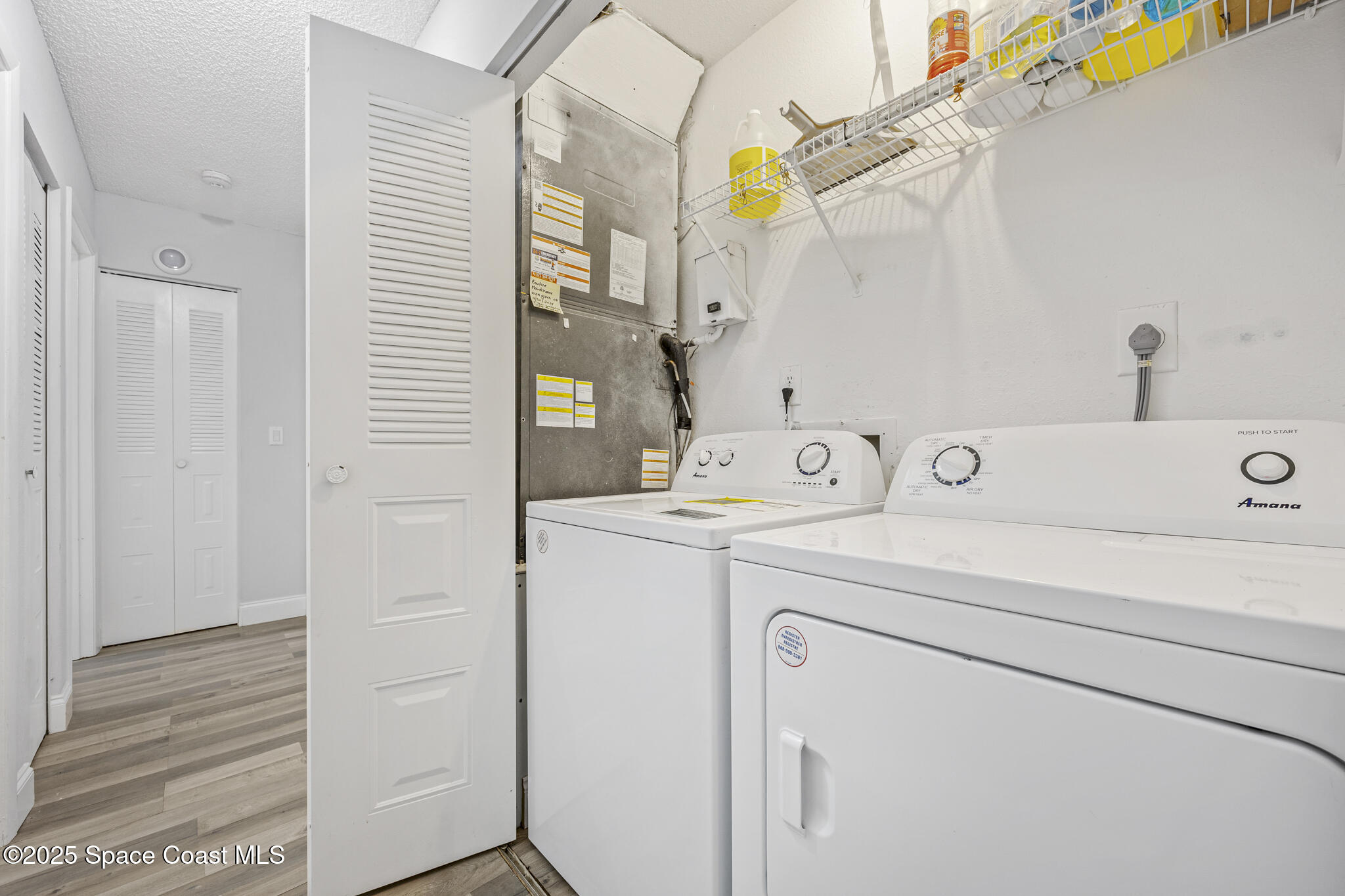 797 Tooley Road Southwest Palm Bay, FL 32908 - Photo 28 of 38 a utility room with dryer and washer