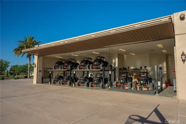a kitchen with granite countertop stainless steel appliances a stove microwave and sink