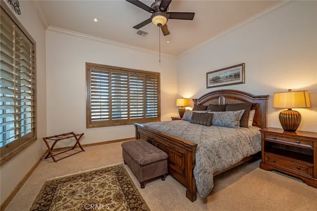 a view of a lake with houses in the back