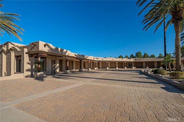 a view of a chairs and table in the parking