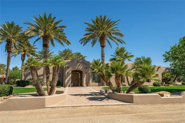 a kitchen with cabinets and a stove