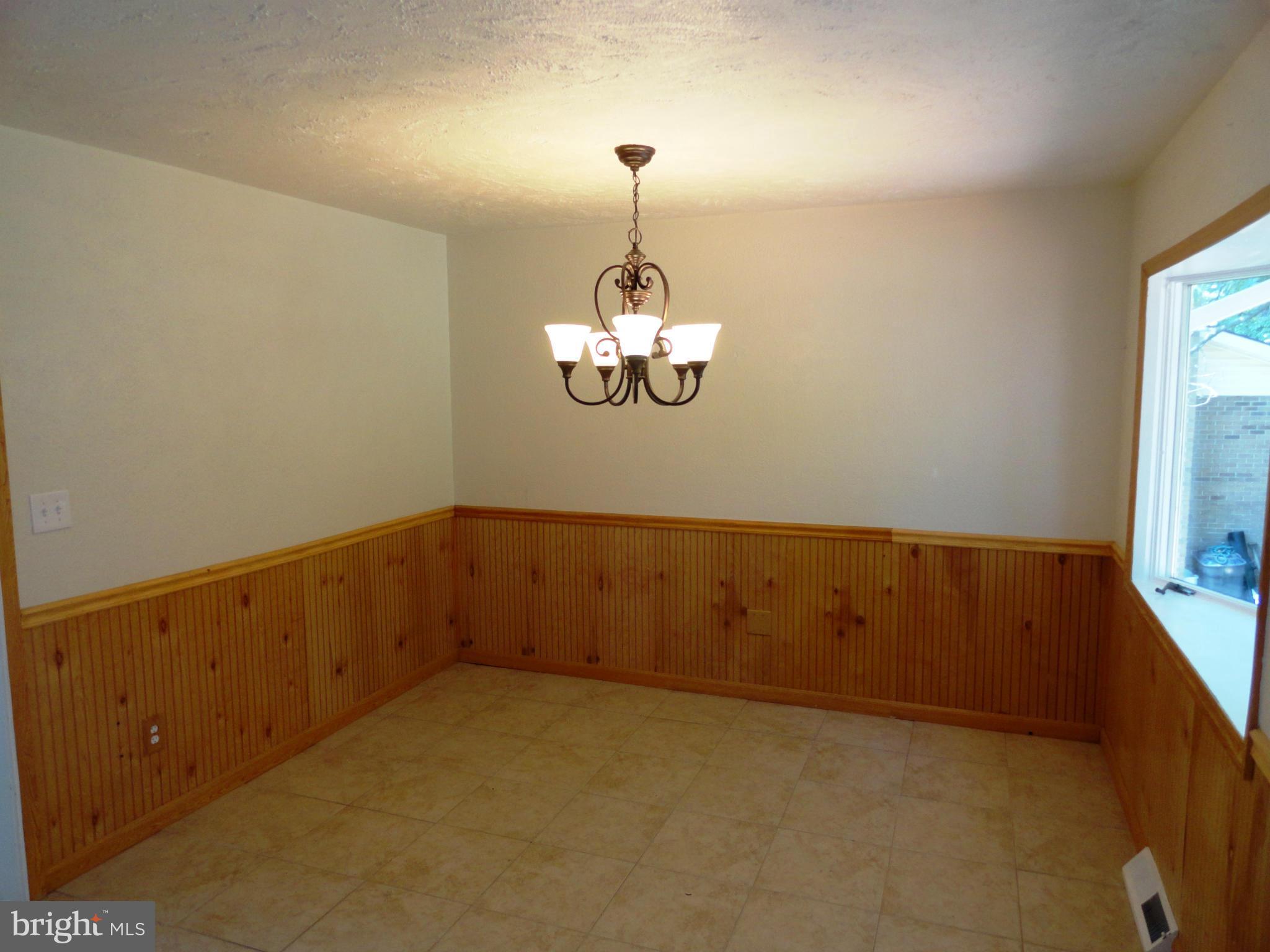 1614 Weyburn Road Baltimore, MD 21237 - Photo 11 of 25 a view of a room with an entryway
