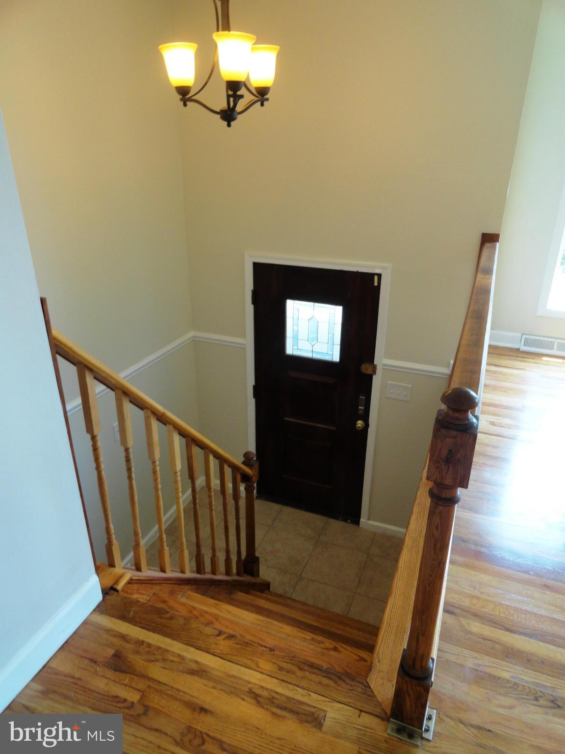 1614 Weyburn Road Baltimore, MD 21237 - Photo 3 of 25 a view of entryway with wooden floor