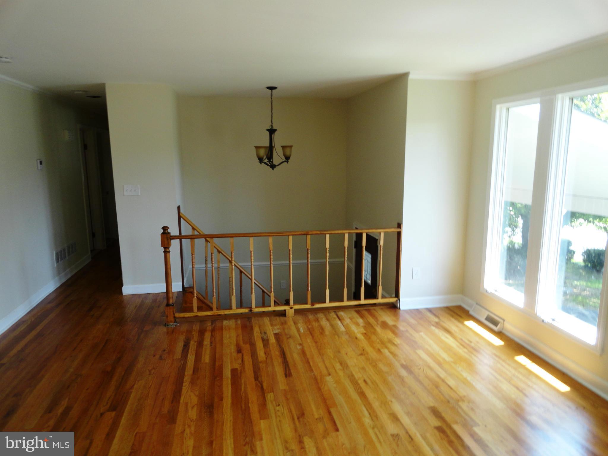 1614 Weyburn Road Baltimore, MD 21237 - Photo 7 of 25 a view of entryway with wooden floor
