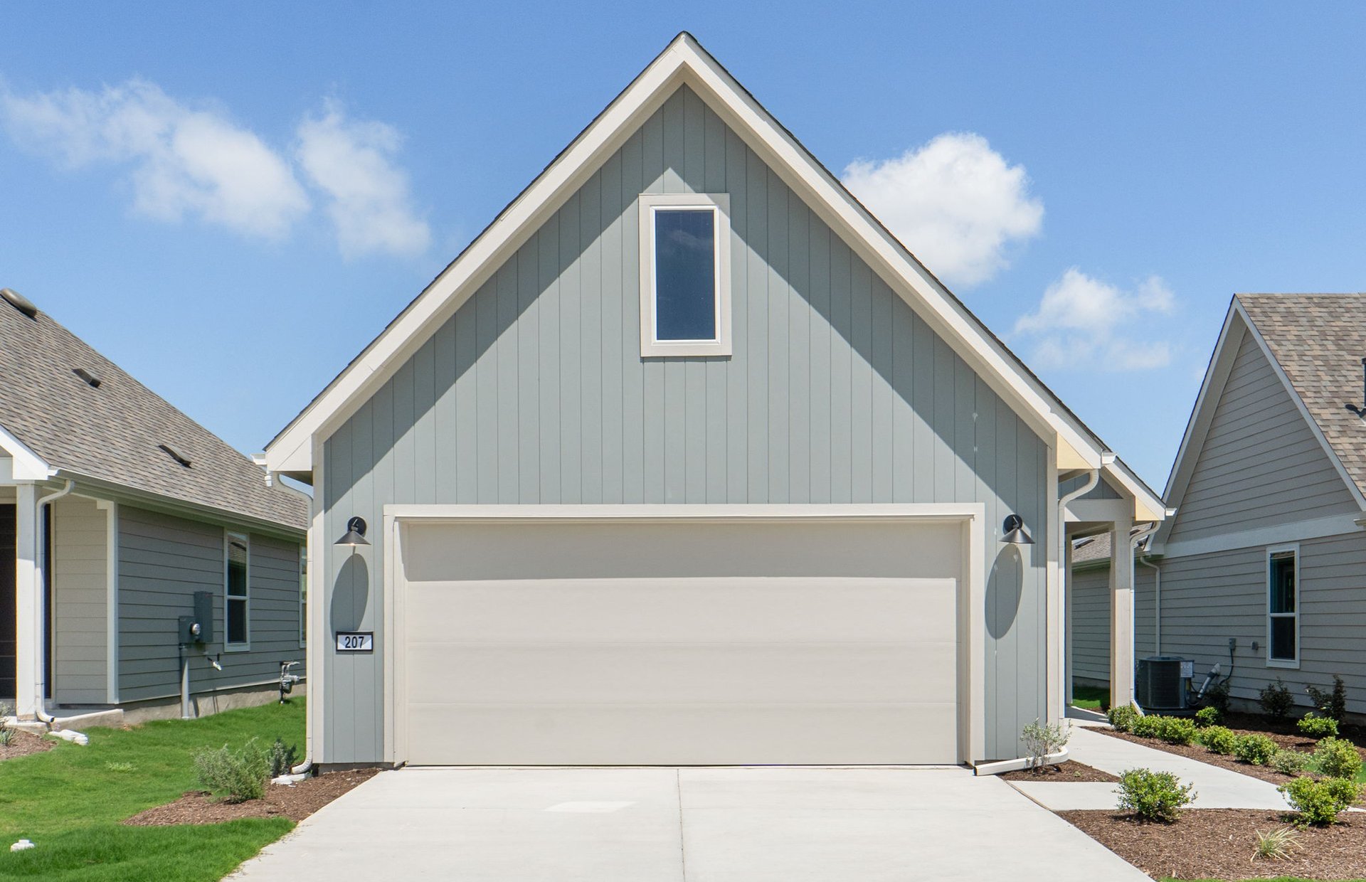 207 Smokestack Lane Georgetown, TX 78633 - Photo 1 of 21 a front view of a house with garden