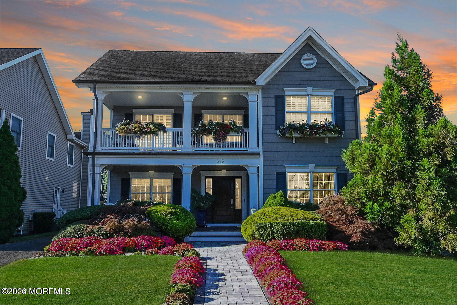 513 Mercer Avenue Spring Lake, NJ 07762 - Photo 14 of 61 a front view of a house with a yard