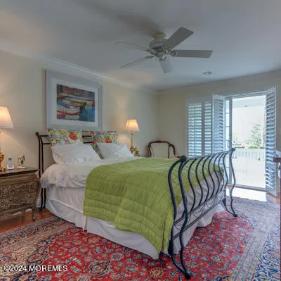 a living room with furniture a flat screen tv and kitchen view