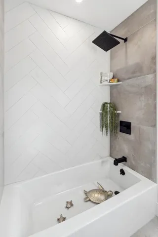 a bathroom with a sink and a bathtub