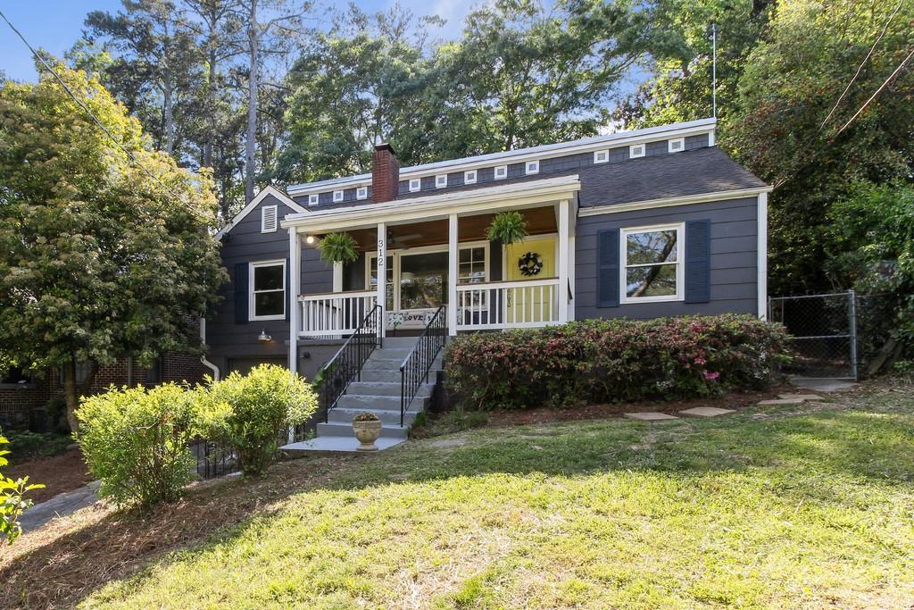 312 Huron Street Decatur, GA 30030 - Photo 1 of 1 a front view of a house with a yard